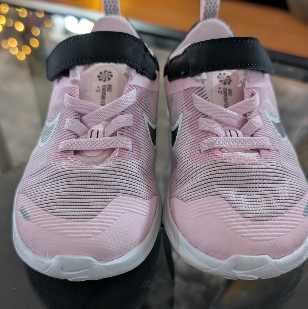 Kids Pink and Black Nike Shoes